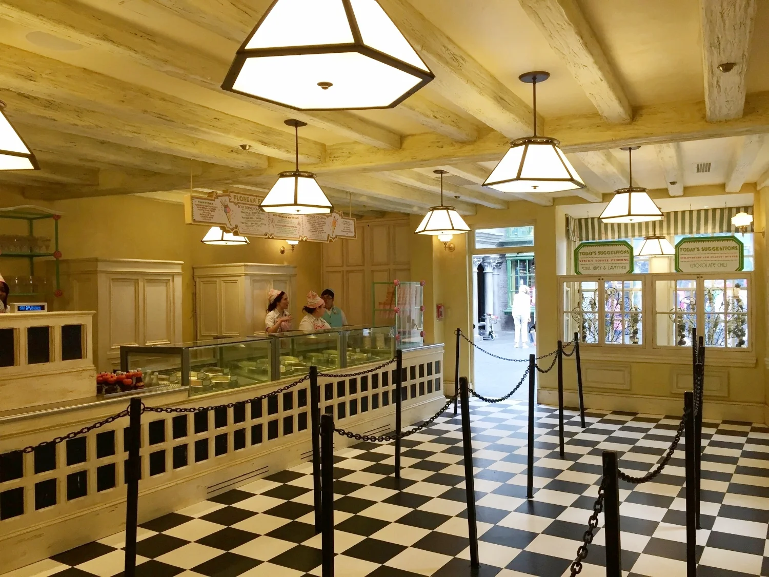 The inside of Florean Fortescue's Ice Cream Parlour consists of a counter and a queue. There is no seating. 
