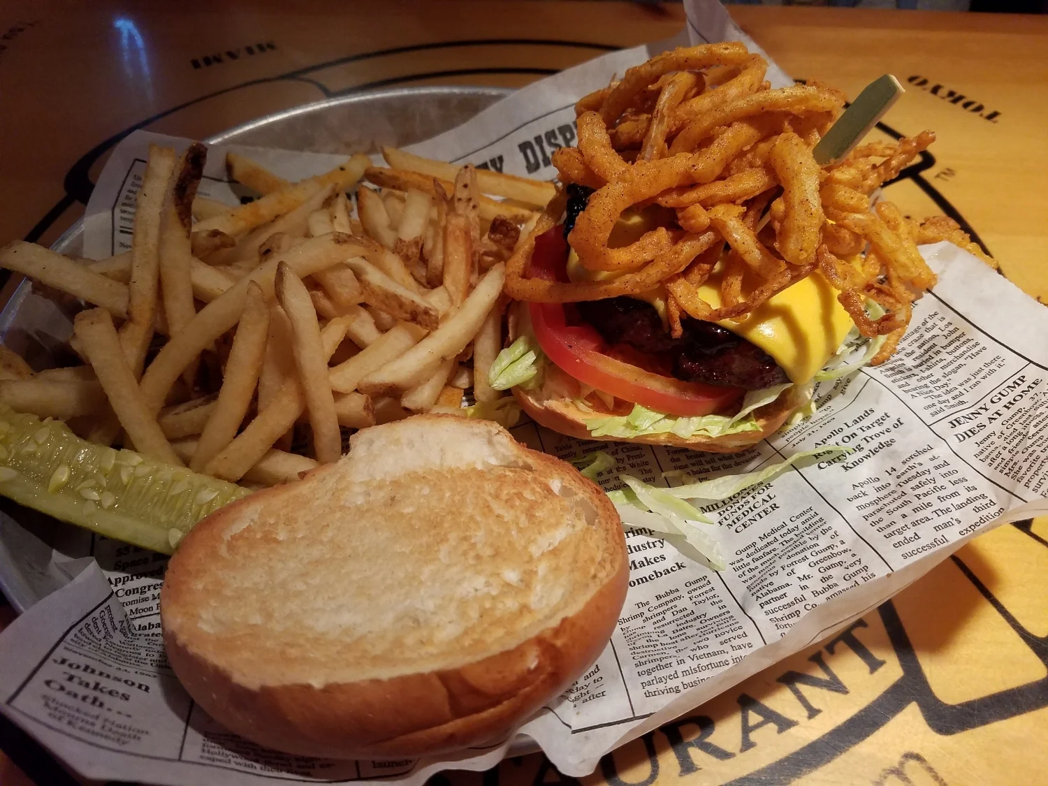 All American Cheeseburger with Frizzled Onions, BBQ Sauce, and Fries from Bubba Gump Shrimp Co.