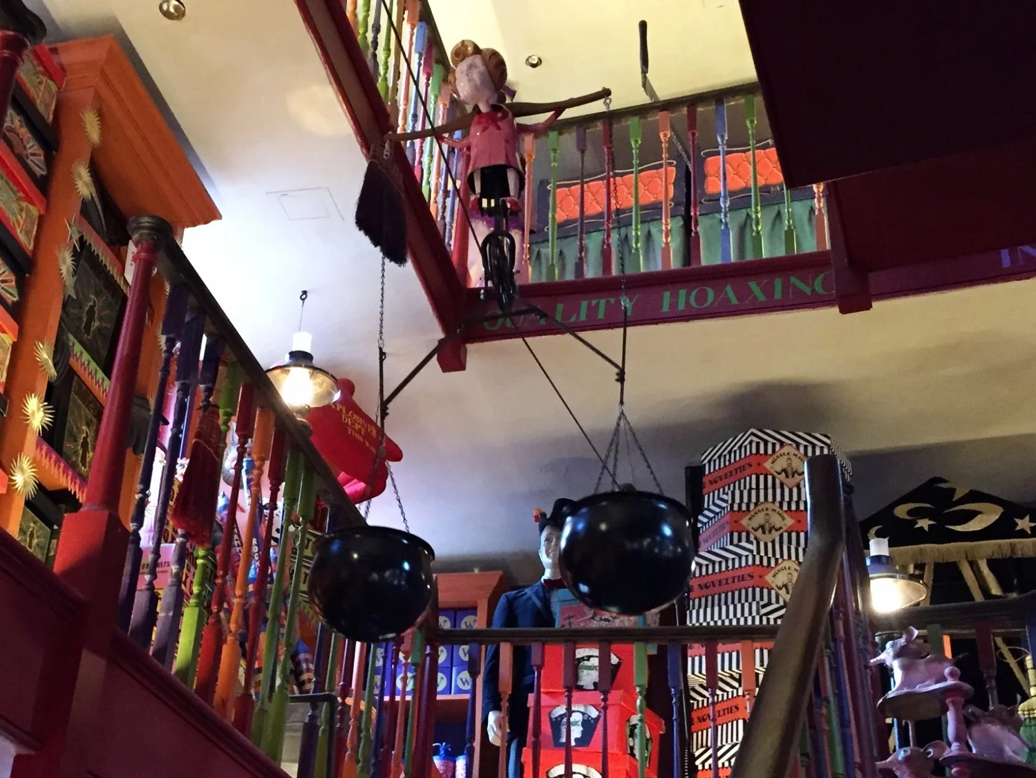 Umbridge on unicycle in Weasley's Wizard Wheezes.