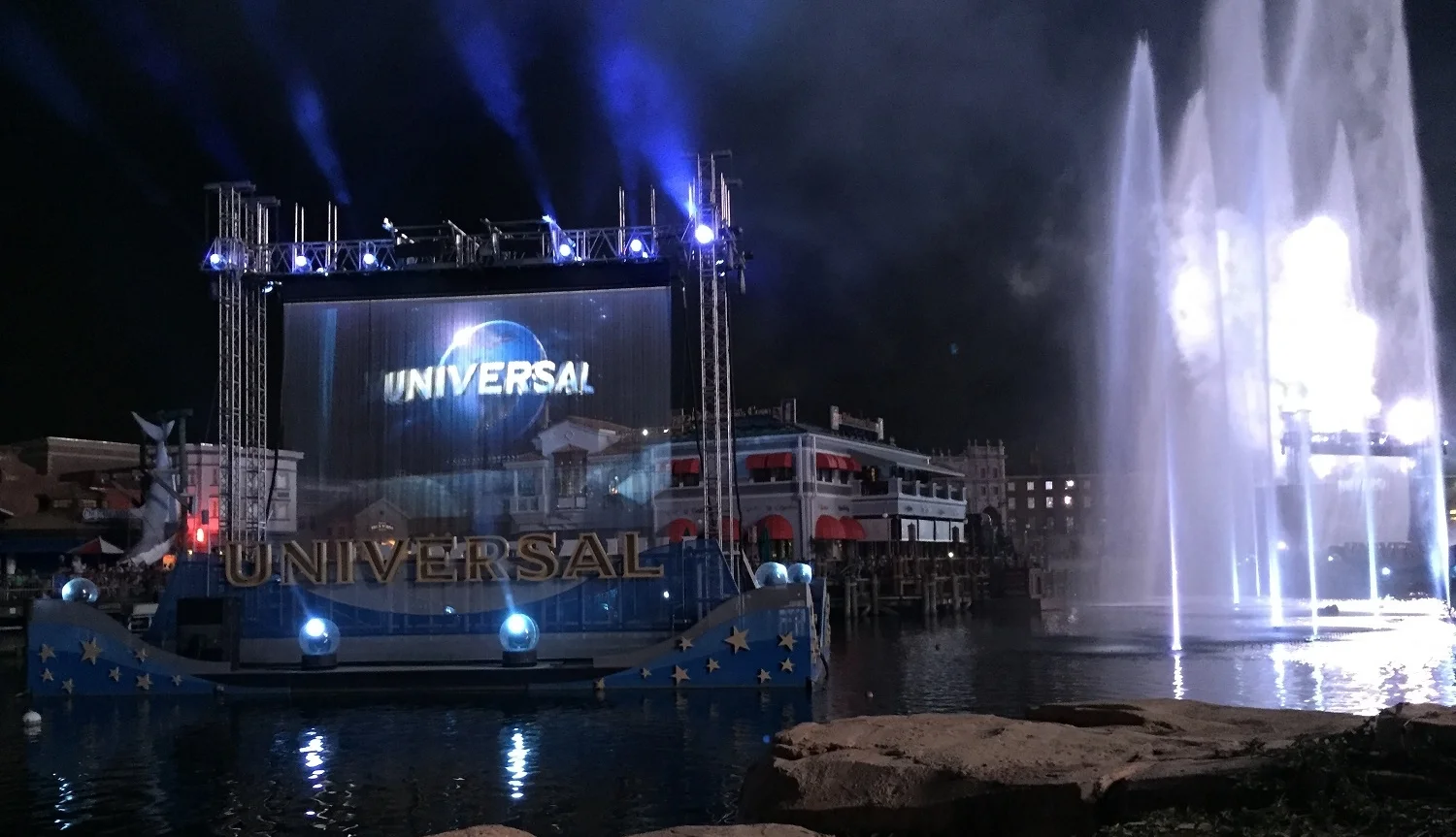 Images were projected on waterfall screens while fountains danced in the water and fireworks exploded in the air.