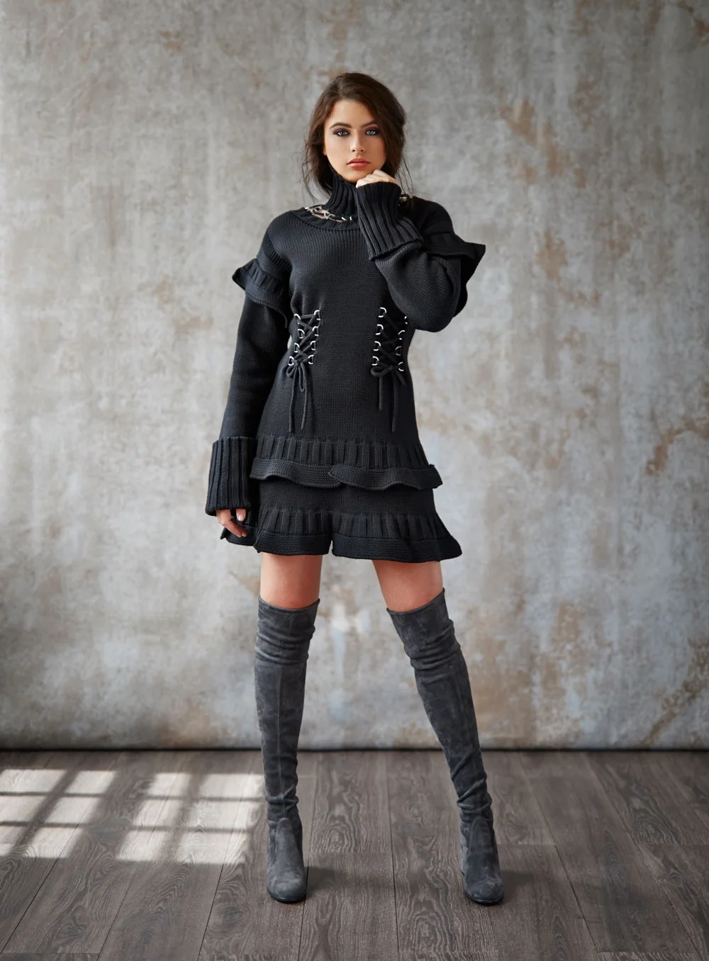 Alexander McQueen sweater dress; Stuart Weitzman over-the-knee suede boots