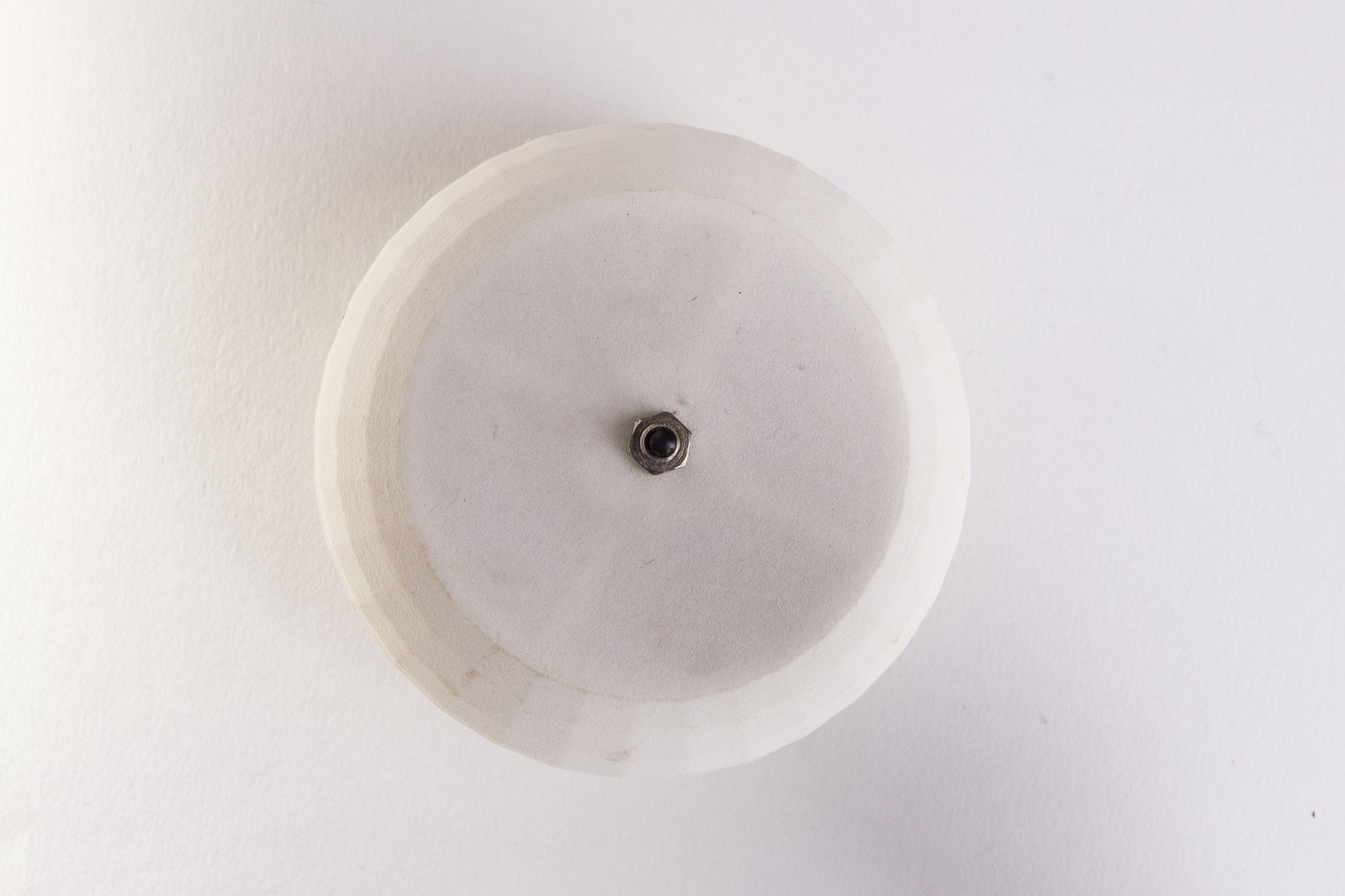 An early case was 3 D printed in space ship style. It was pretty but too heavy to mount on the mirror. 