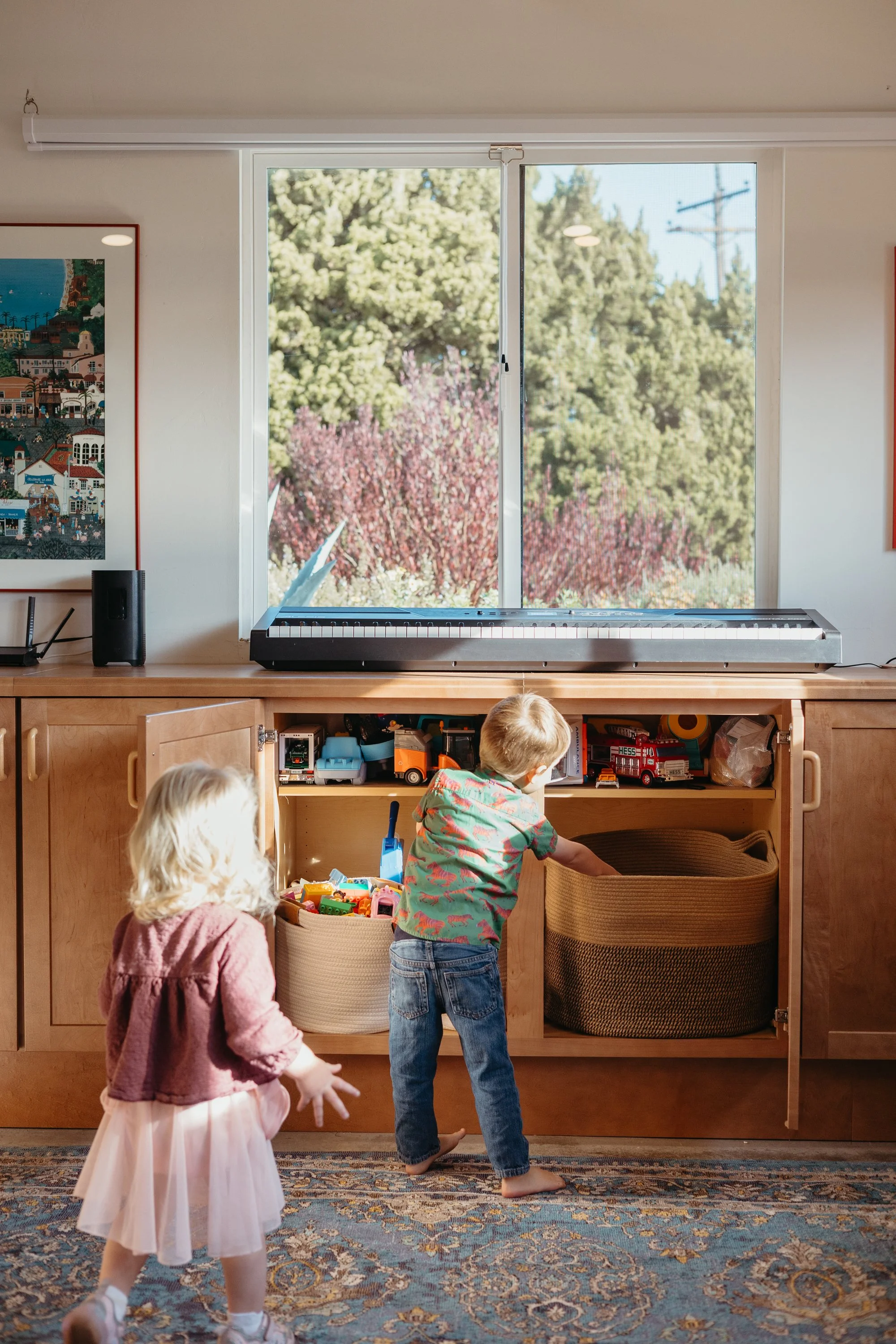 Before and after garage conversion with living room, laundry room, and home office
