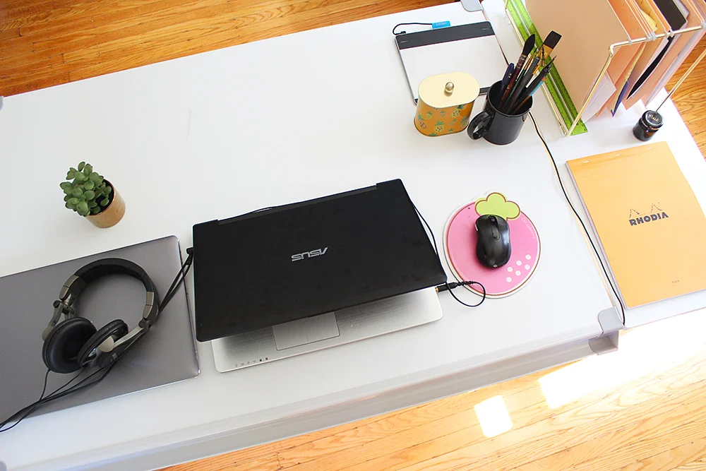 Two laptops because I still haven't finished transferring all of my old things to the new one....