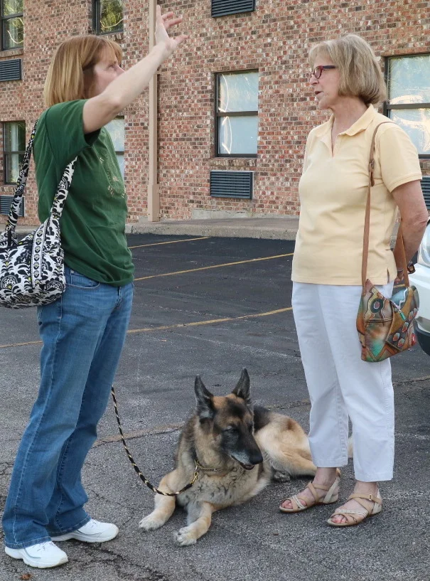 Sally Hamm, Kona and Rosi von Fintel visit before the May meeting.