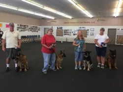 Ray Laughlin with Jäger , Susan Hunt with Roxie , JC Gipe with Armina , and Betty Laughlin with Harry .