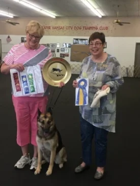 Club member, Cindy Hartman and her GSD, Willa , cleaned up at the trial with High Scoring GSD in the trial and placing in Open A. She only needs one more qualifying score to finish her title. Cindy Hartman pictured with Willa and Judge Nancy Cheski.