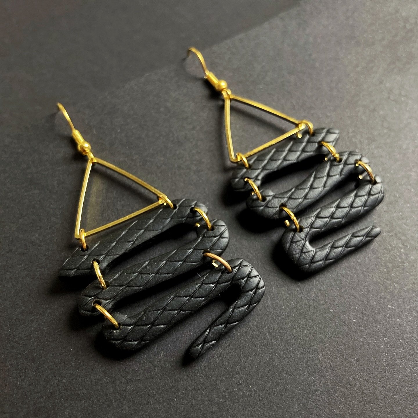 None more black snake earrings: now available.