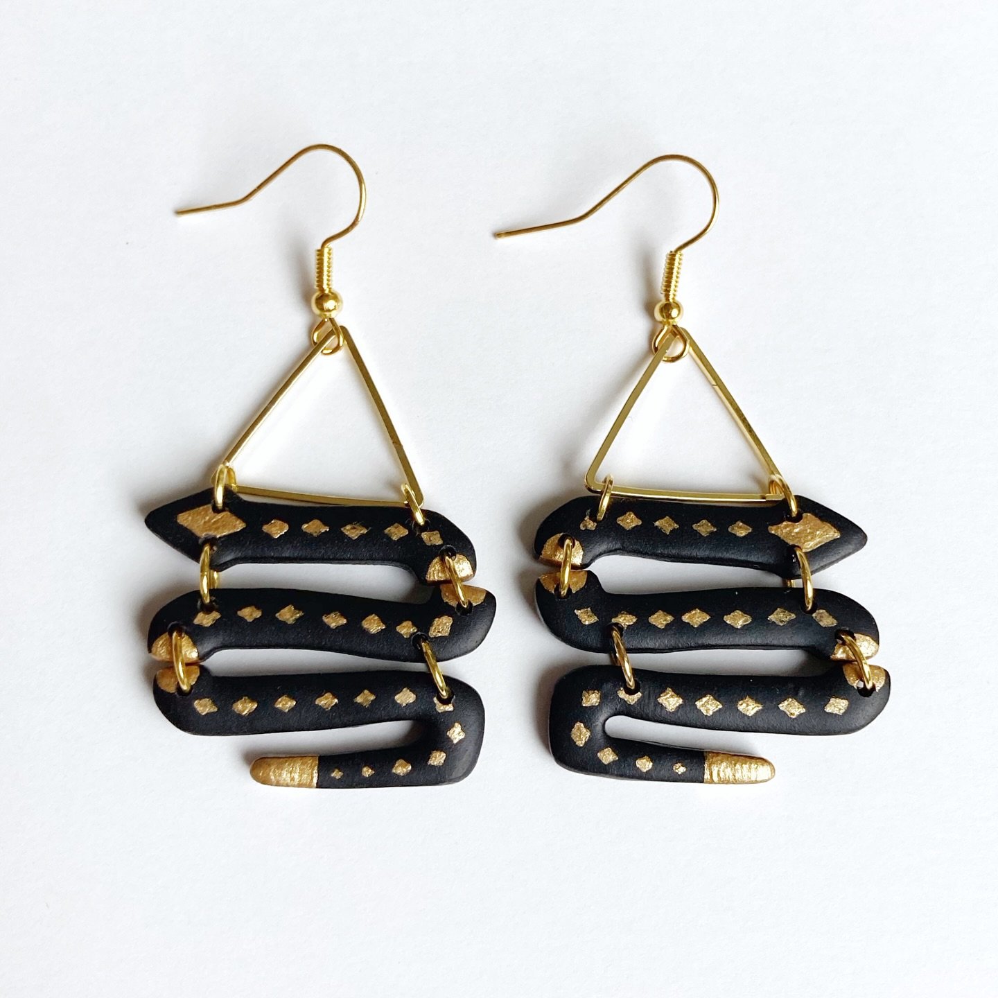 Lust-worthy black and gold diamond gilded earrings, now available.