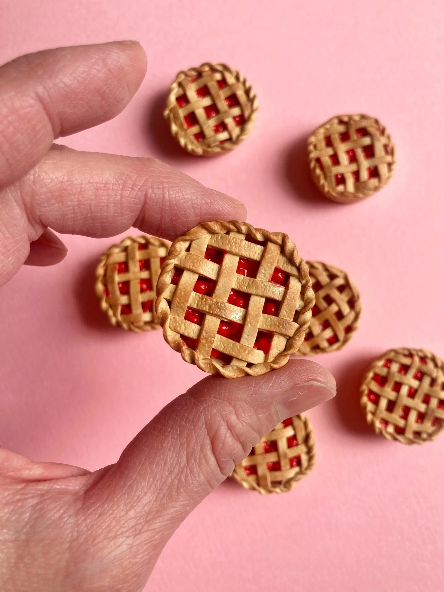 Cherry lattice pie magnets!! 🍒 First dibs at @piepicnic tomorrow, pi day, 3/14 💃🏽😋 

Each one of those tiny cherries was hand-rolled 😅

#PiDay