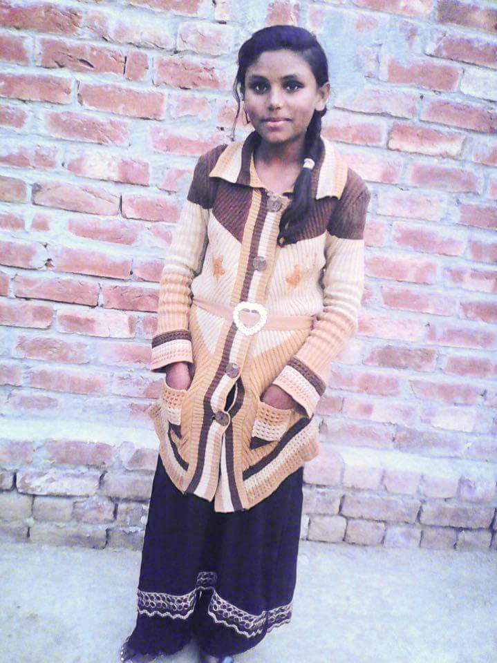A Christmas gift of a sweater/coat for Nisha