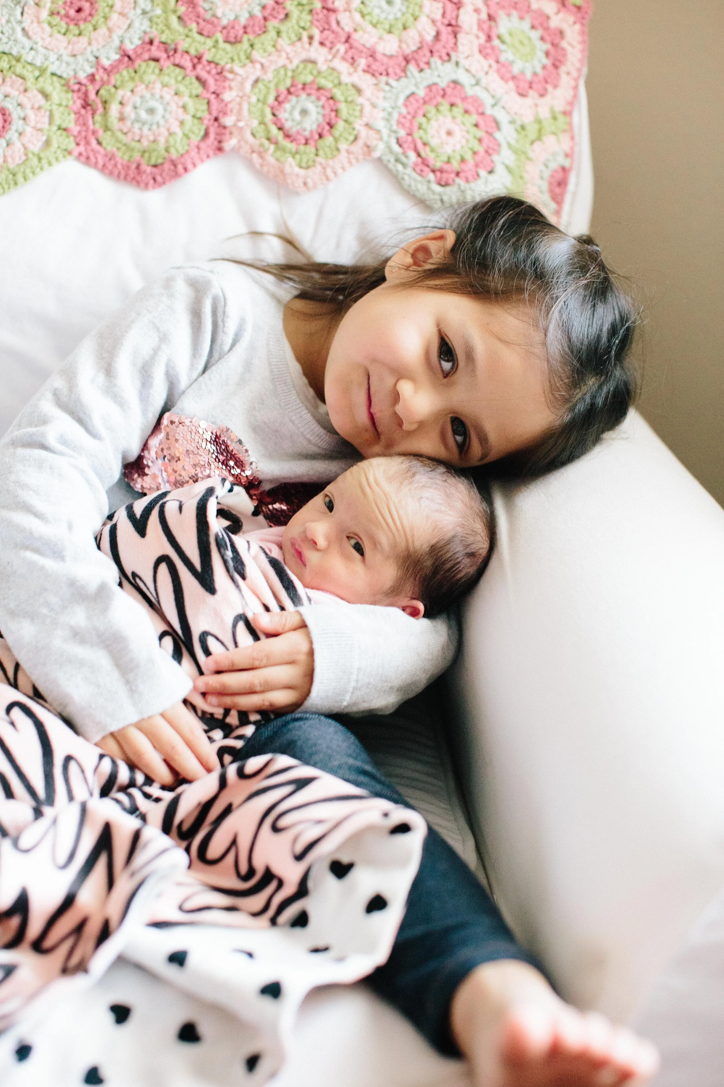 newborn sisters lifestyle portrait.JPG