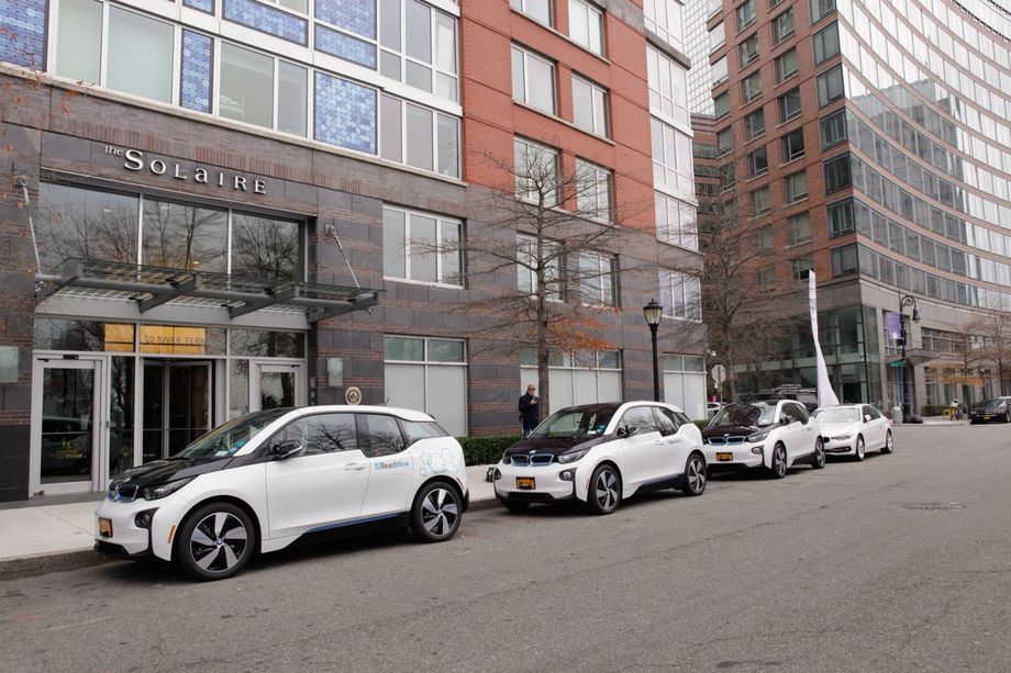  A row of electric BMW i3’s that are part of a new car-sharing program being launched for residents of a Manhattan apartment building. BMW/ReachNow 