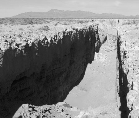 DOUBLE NEGATIVE, FROM THE EDGE OF THE WORK