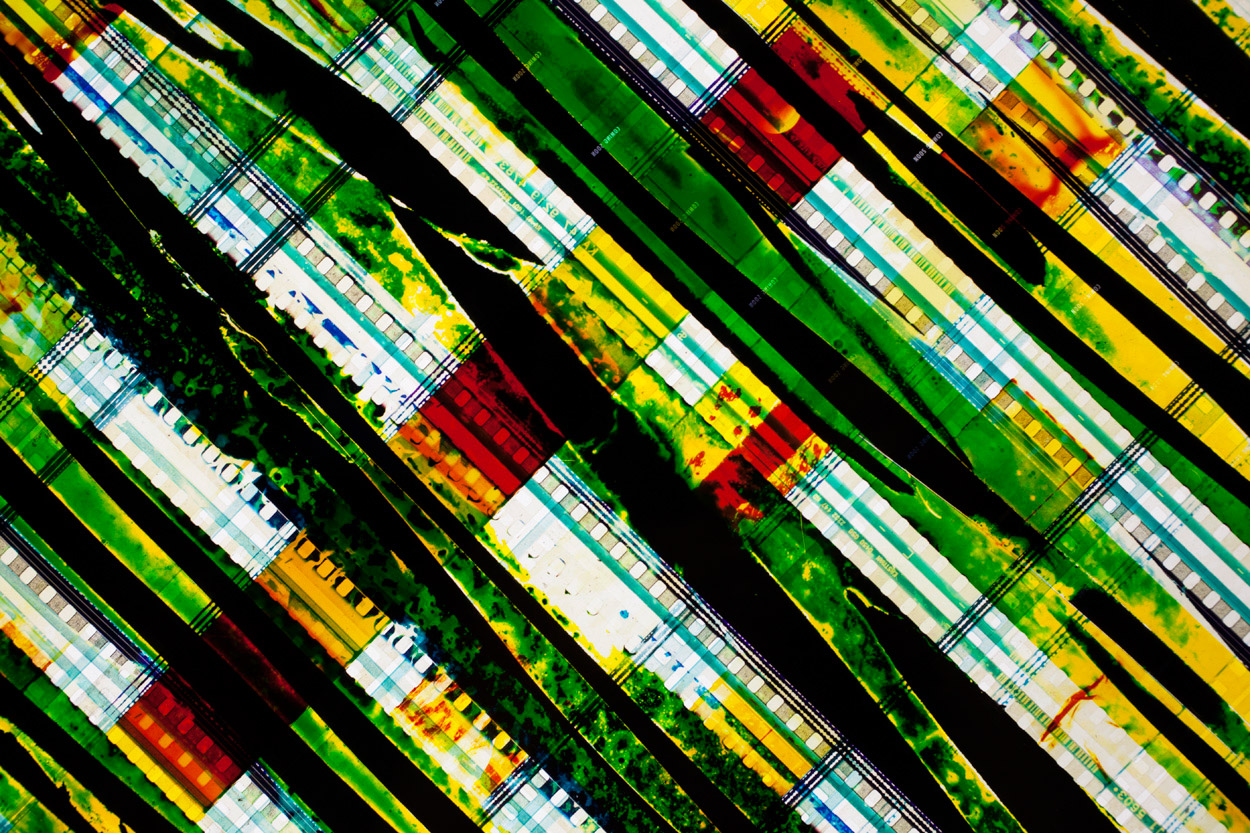 X (Detail). 35mm Celluloid Film, Fluorescent Lights, Plexiglas, Custom Lightbox. 40 x40 x6. Richard Kerr. 2014. (Detail).