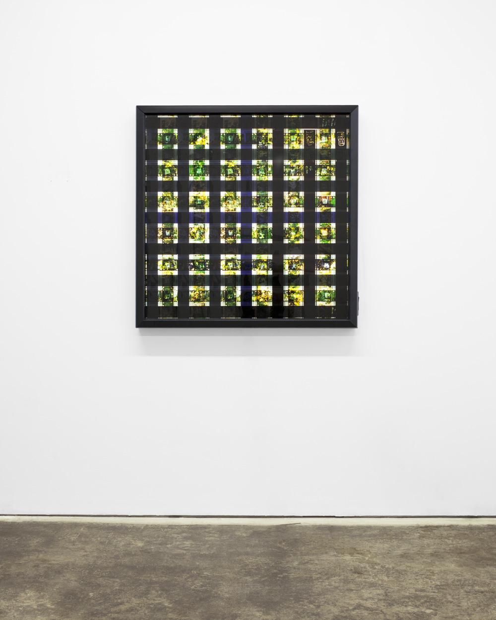 HEAD. 65mm IMAX Celluloid Film, Fluorescent Lights, Plexiglas, Custom Lightbox. 40x40x6. Richard Kerr. 2014.
