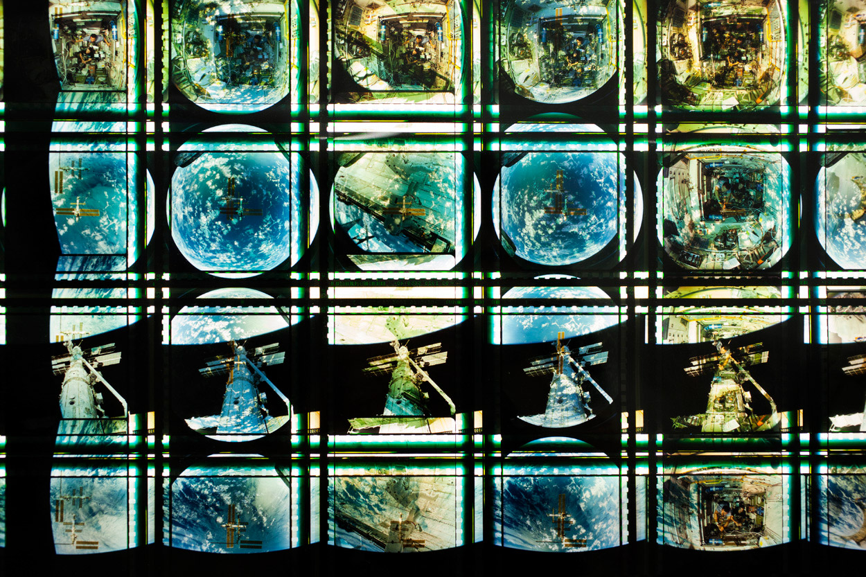 Space Program . 65mm IMAX Celluloid Film, Fluorescent Lights, Plexiglas, Custom Lightbox. 40 x40 x6. Richard Kerr. 2014. (Detail).
