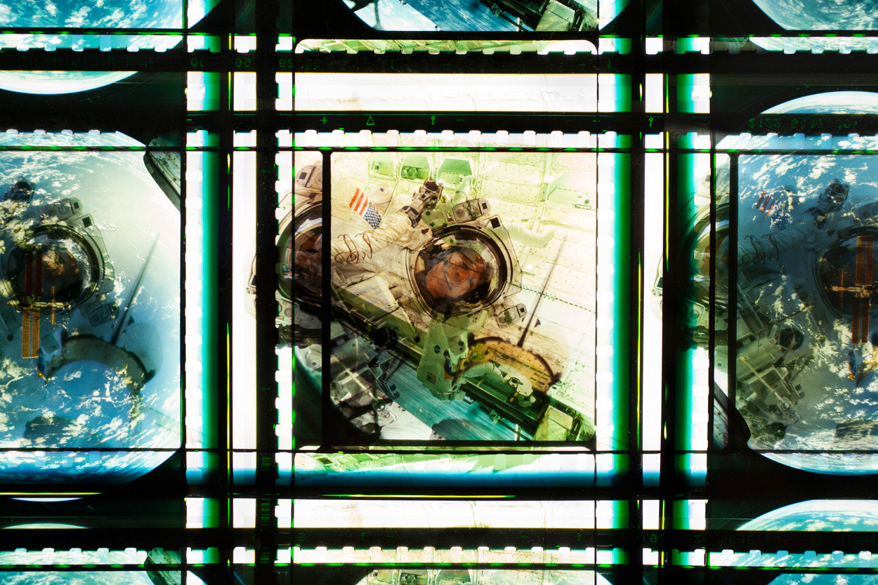 Space Program . 65mm IMAX Celluloid Film, Fluorescent Lights, Plexiglas, Custom Lightbox. 40 x40 x6. Richard Kerr. 2014. (Detail).