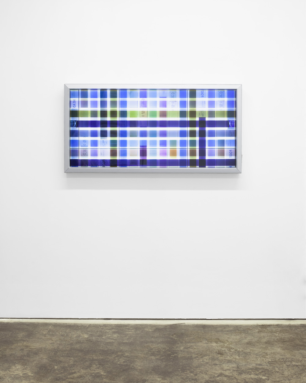 Print Inspection. 65 mm IMAX Celluloid Film, Fluorescent Lights, Plexiglas, Custom Lightbox. 52x26x6. Richard Kerr. 2014.