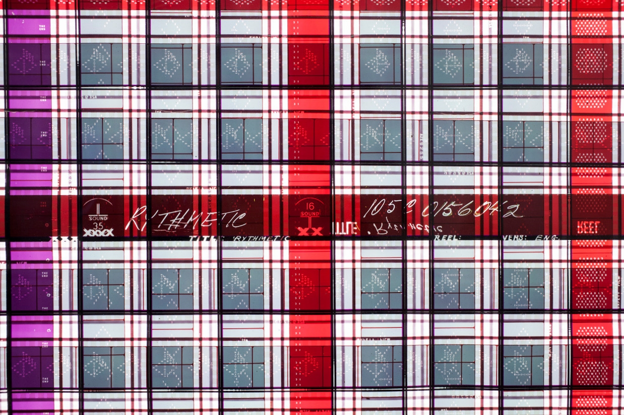 Rhythmic One . 35mm Celluloid Film, Fluorescent Lights, Plexiglas, Custom Lightbox. 52x26x6. Richard Kerr. 2014. (Detail).
