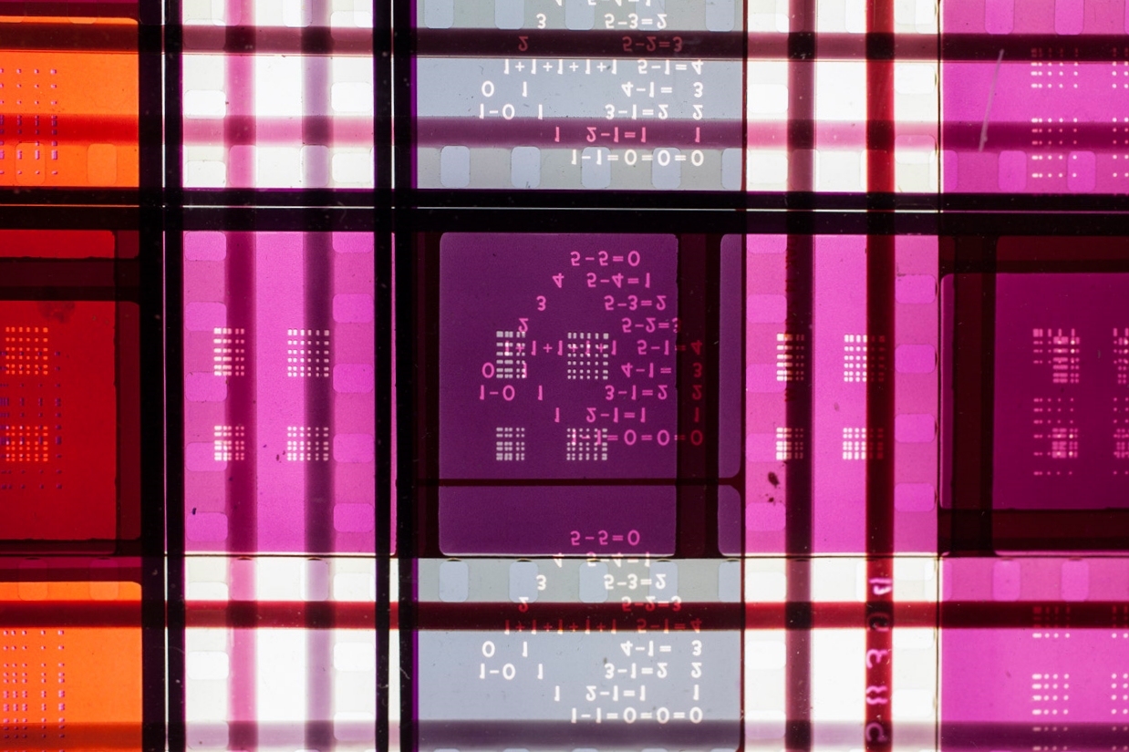 Rhythmic Three . 35mm Celluloid Film, Fluorescent Lights, Plexiglas, Custom Lightbox. 52x26x6. Richard Kerr. 2014. (Detail).