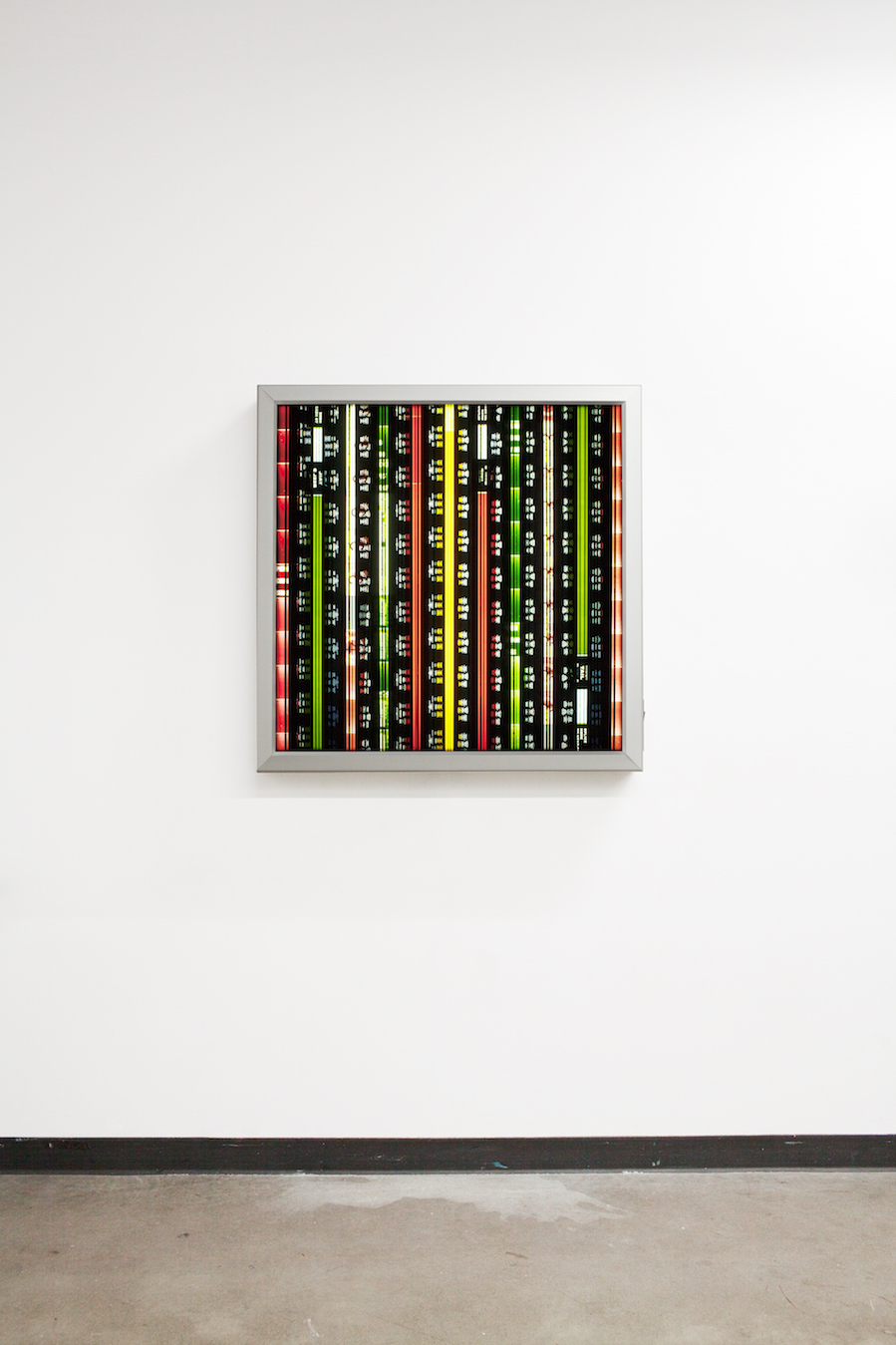 Space Credits 2. 65mm Celluloid Film, Fluorescent Lights, Custom Lightbox. 30x30x6. Richard Kerr. 2016.