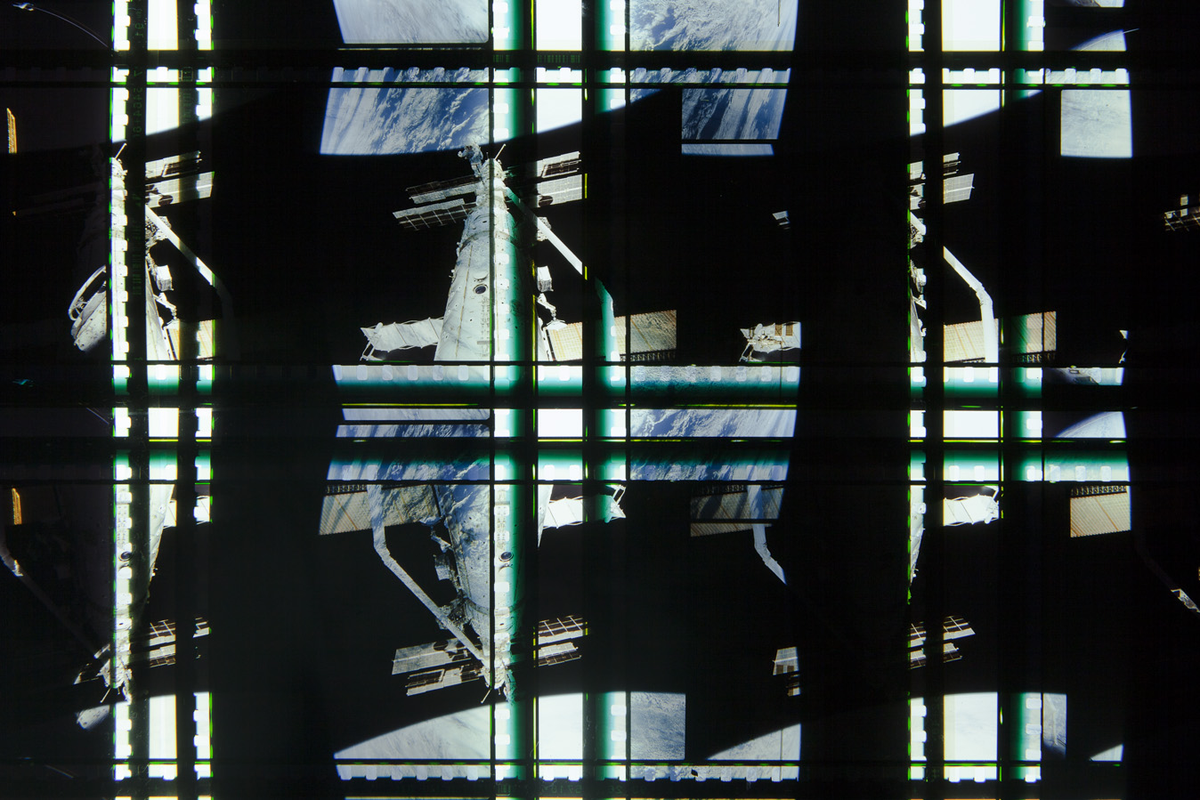 Space Program 2. 65mm Celluloid Film, Fluorescent Lights, Custom Lightbox. 30x30x6. Richard Kerr. 2016. (Detail).