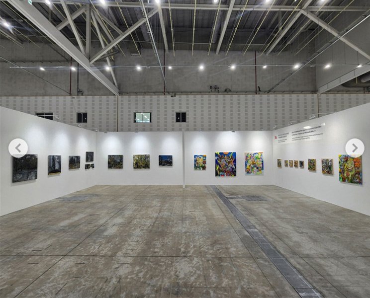 Exhibition view featuring paintings by Tibor Simon-Mazula