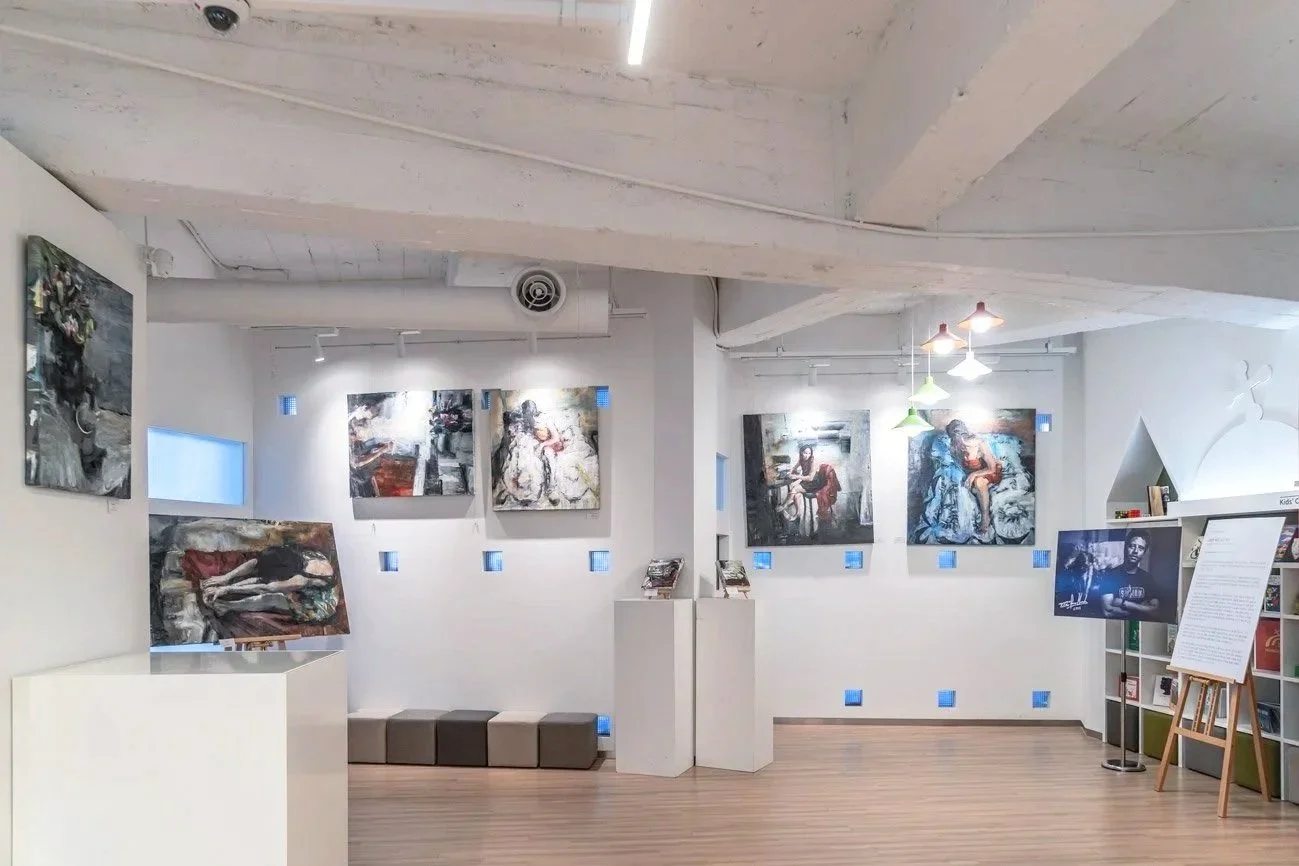 Installation view of Quiet Enchantment, featuring figurative paintings by Tibor Simon-Mazula in a gallery setting, Seoul.