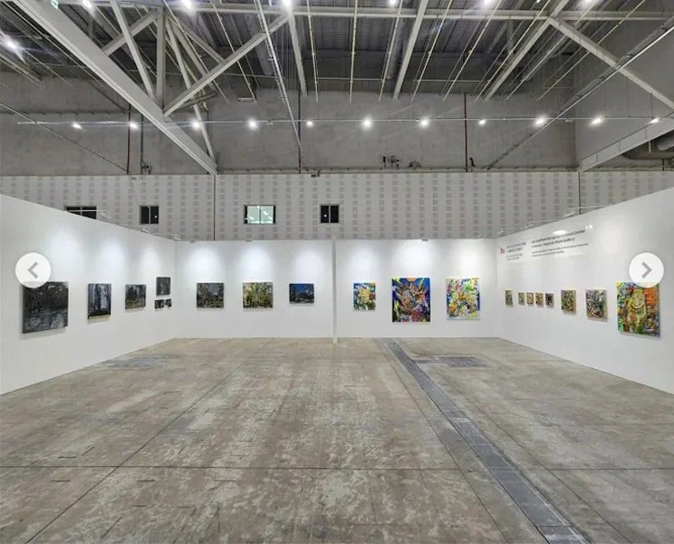 Group exhibition installation view featuring paintings by Tibor Simon-Mazula
