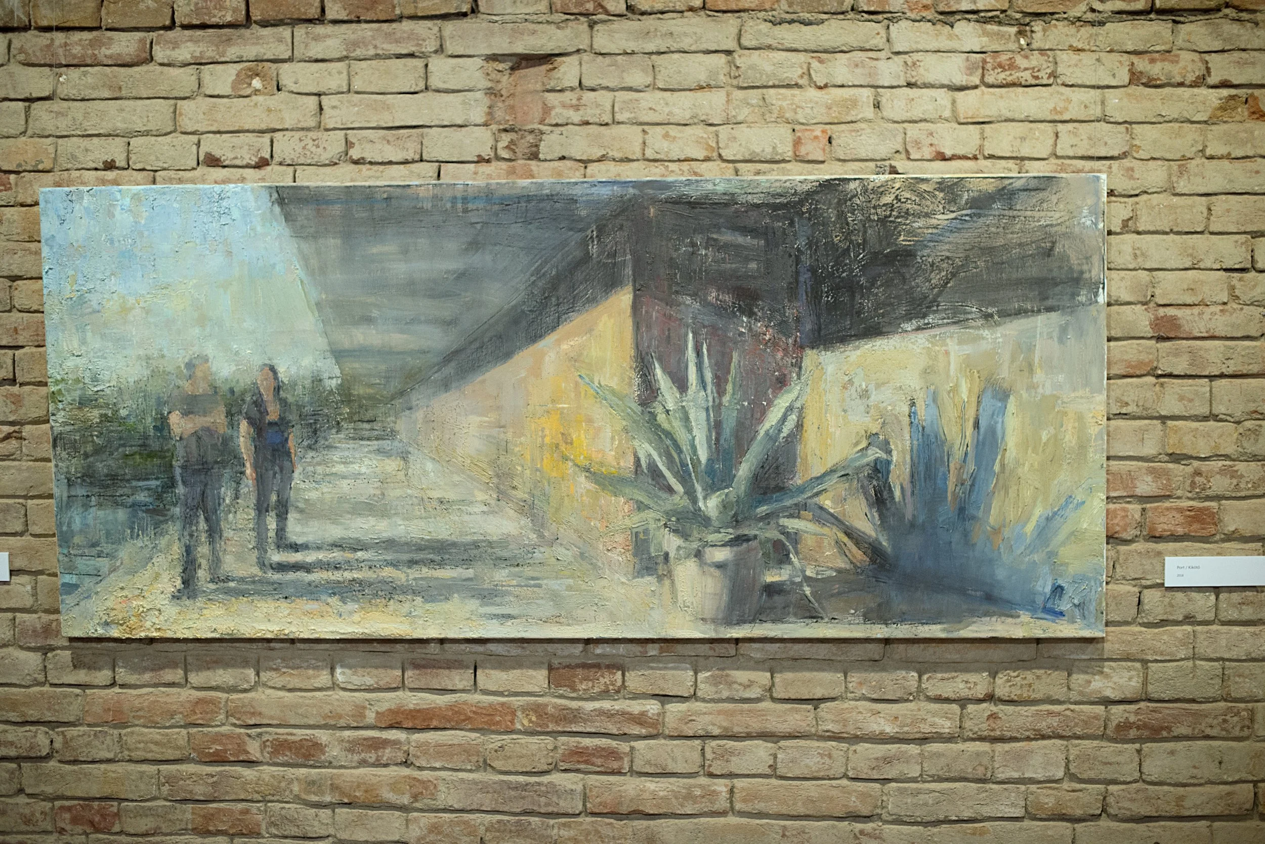 Horizontal figurative painting by Tibor Simon-Mazula combining human figures and architectural space, emphasizing painterly reduction, spatial tension, and a restrained, atmospheric palette.