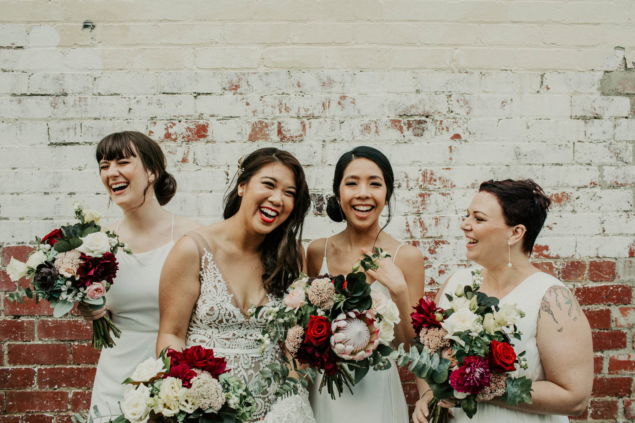 Bridemaids giggle Melbourne wedding photographrer