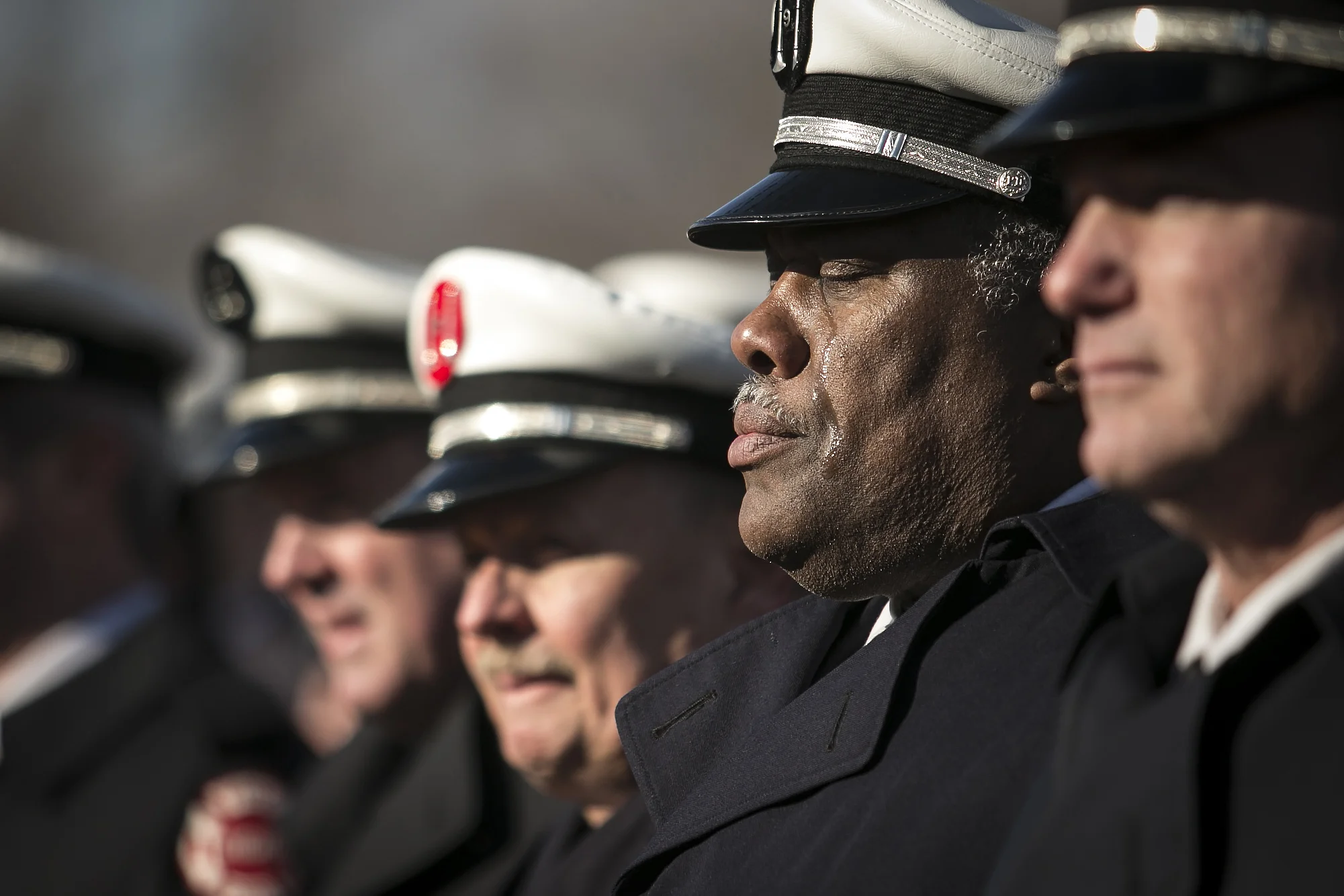  Chicago Fire Department personnel line up for the procession outside St. Rita of Cascia Parish after the funeral services for firefighter Daniel Capuano, Dec. 18, 2015. Capuano, a 15-year veteran of the department assigned to Tower Ladder 34, was battling a warehouse blaze when he fell down an elevator shaft and died on Dec. 14. | Ashlee Rezin Garcia/Sun-Times    A city says goodbye to firefighter Daniel Capuano   