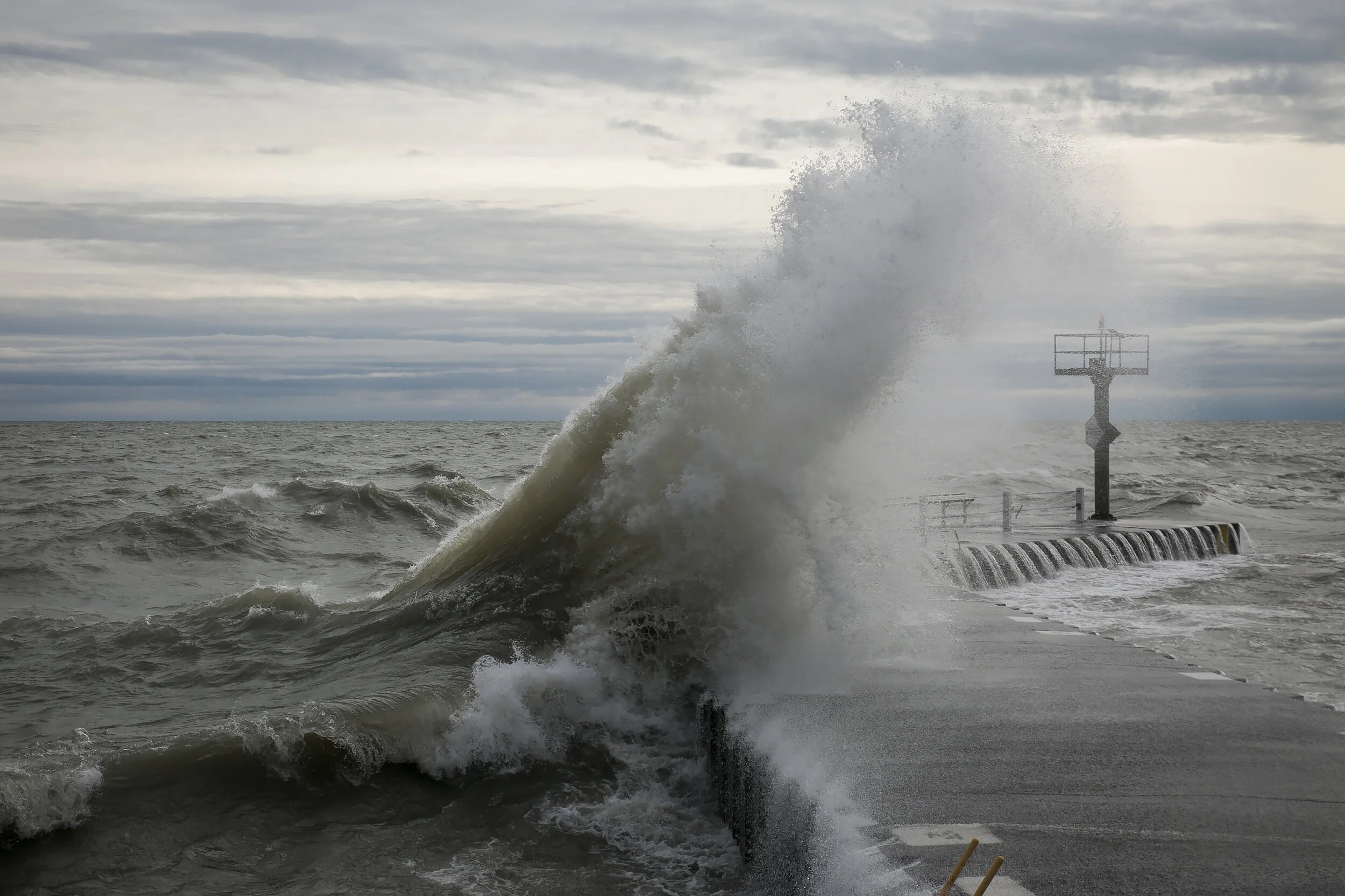 Strong waves crash along the Lake Michigan shoreline near 31st Street Beach, Thursday morning, April 6, 2017. | Ashlee Rezin/Sun-Times