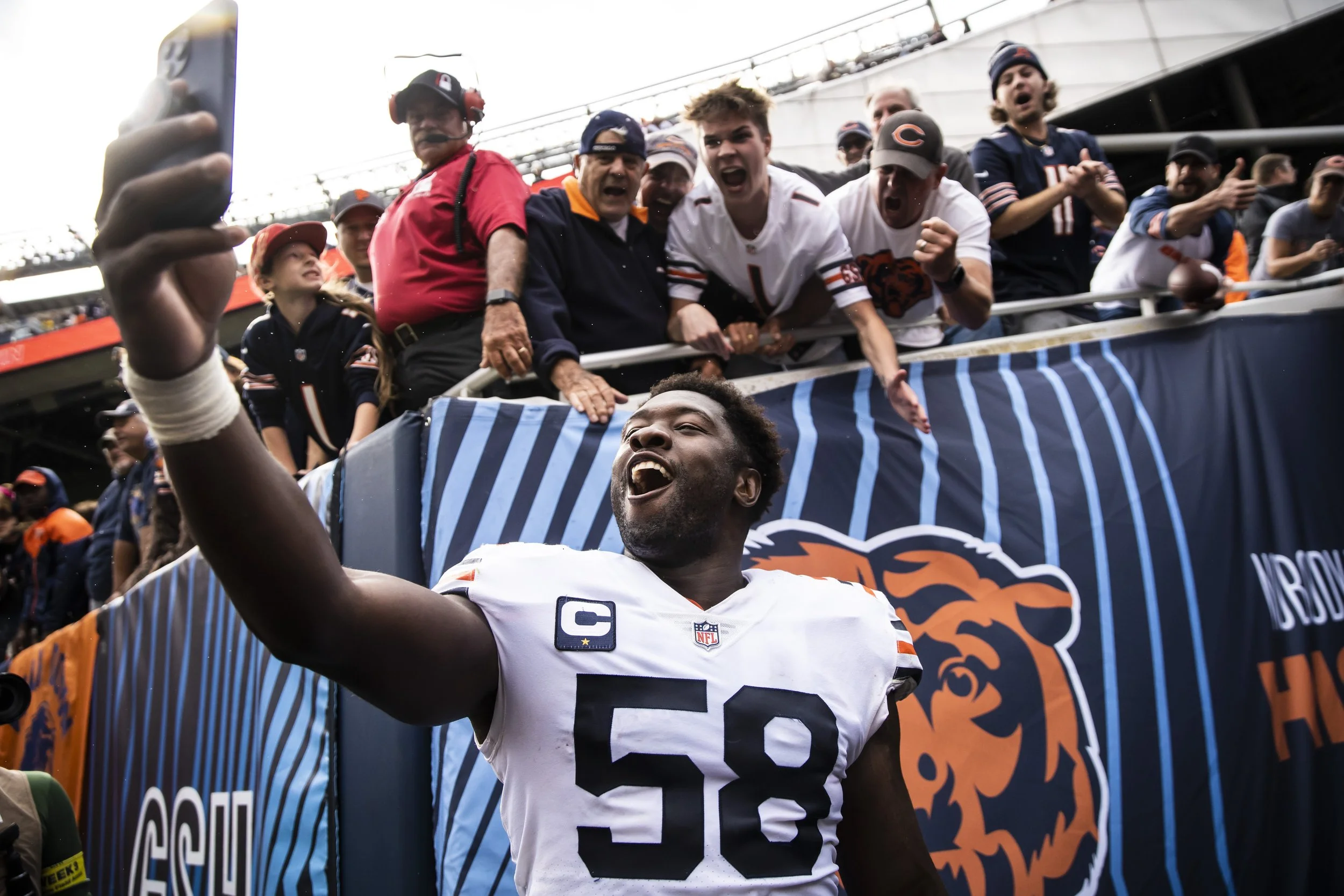  Chicago Bears linebacker Roquan Smith #58 celebrates by taking a selfie with fans after the Bears beat the Texans, 23 - 20, at Soldier Field, Sunday, Sept. 25, 2022. | Ashlee Rezin/Sun-Times    Roquan Smith makes his best pitch in Bears’ win over Te