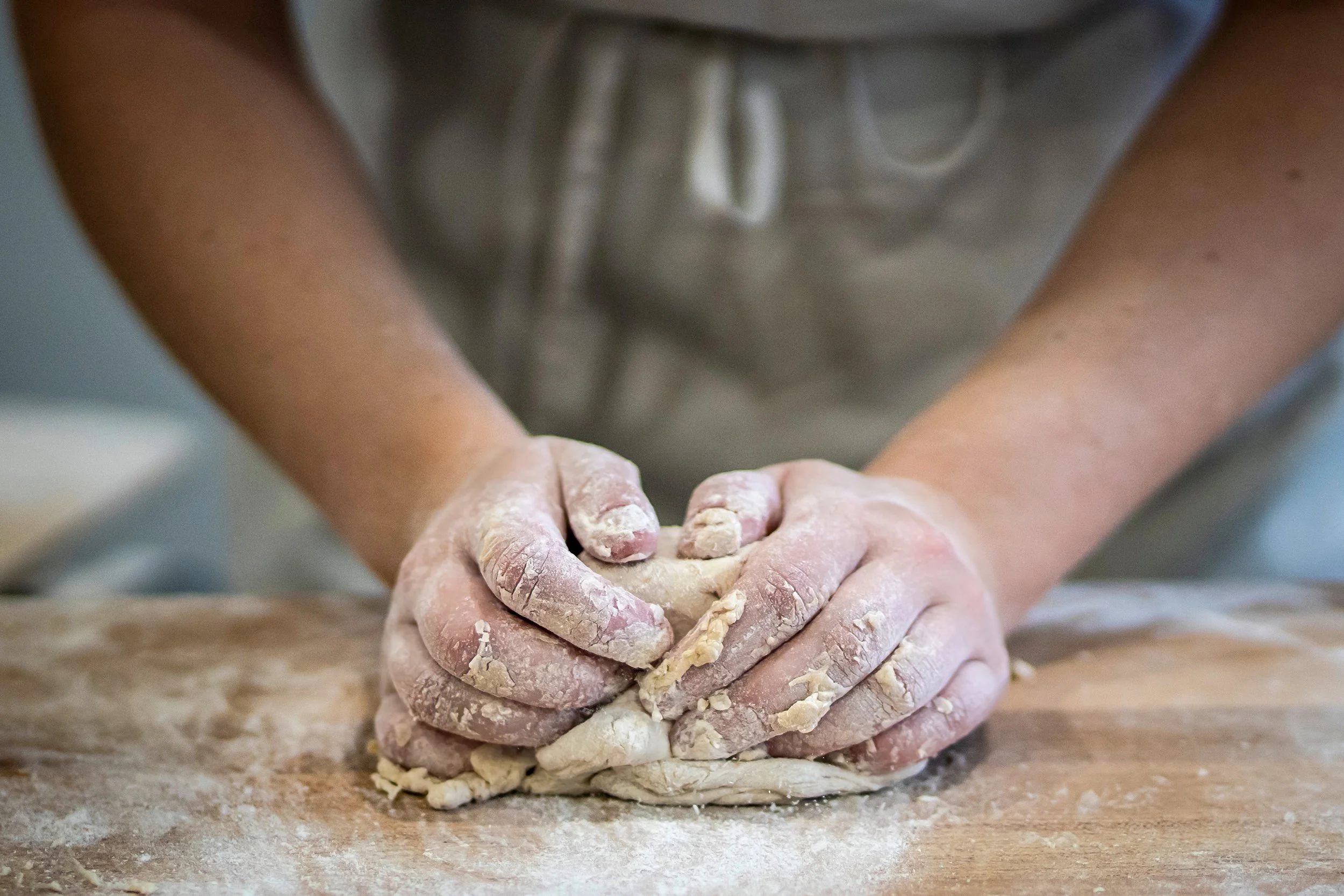  A baker portions dough at Publican Quality Bread at 1759 W. Grand Ave. in West Town, Thursday afternoon, Sept. 29, 2022. | Ashlee Rezin/Sun-Times 