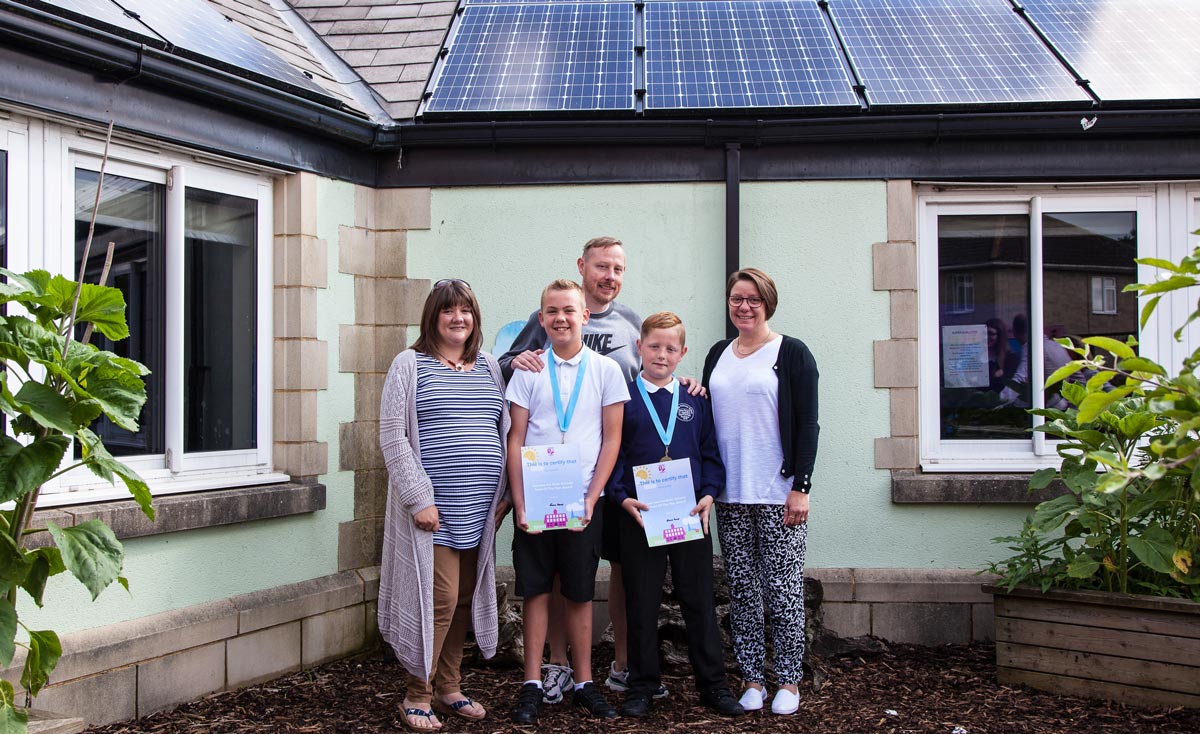 Xander and James with their proud parents