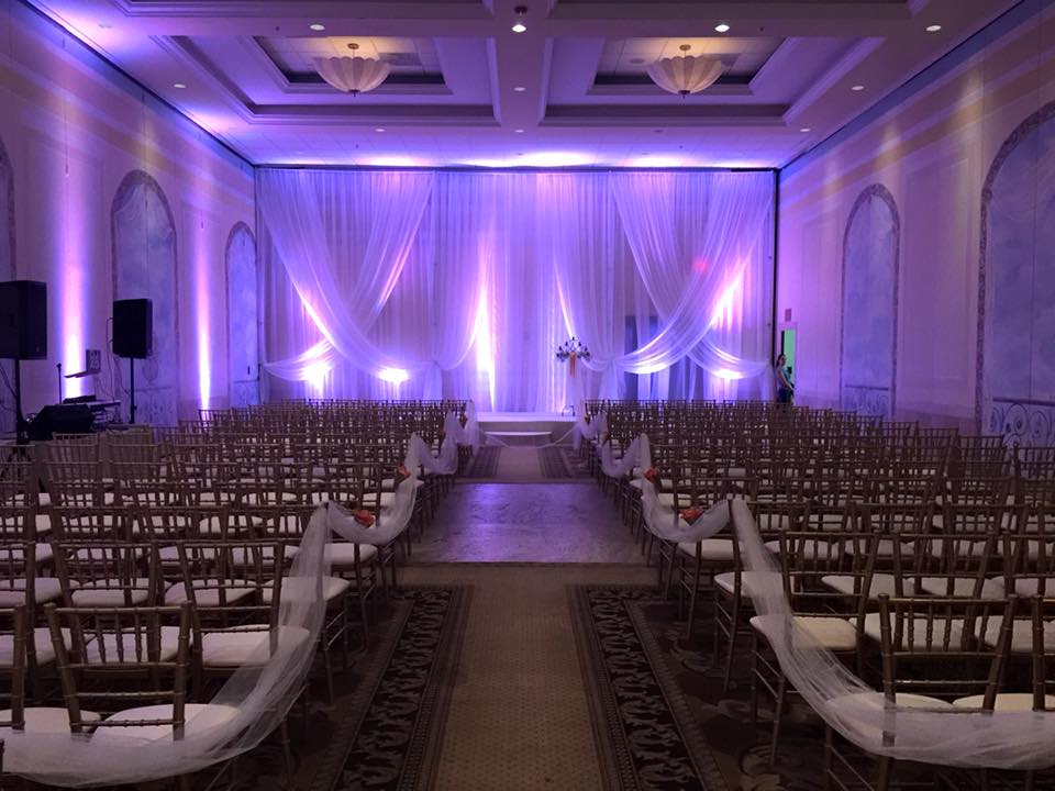 Purple Uplights in Ceremony