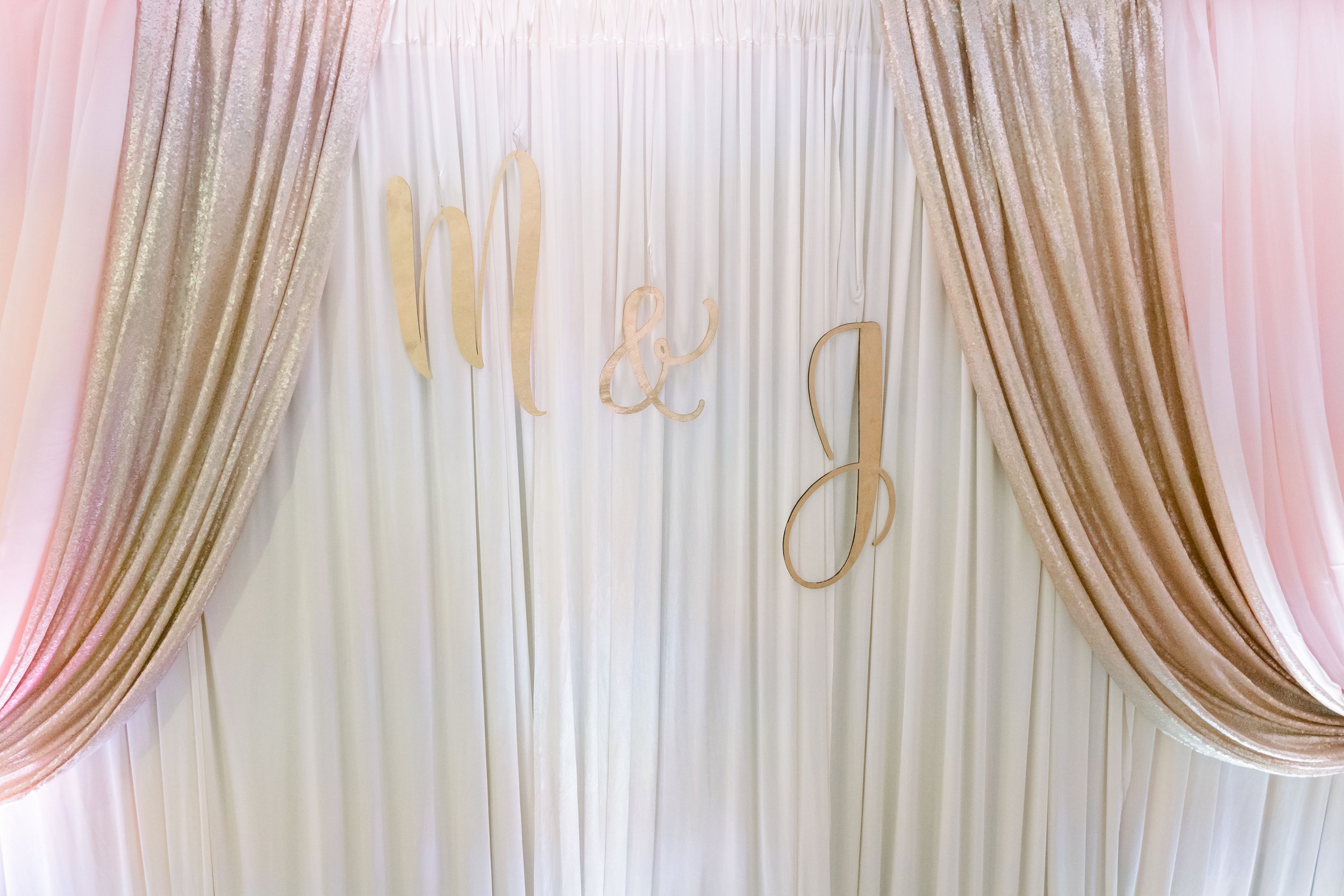 Basement wall draping wedding in the living room garage wall draping intimate wedding at home micro wedding event in chicago chiavari chairs table ren (4).jpg