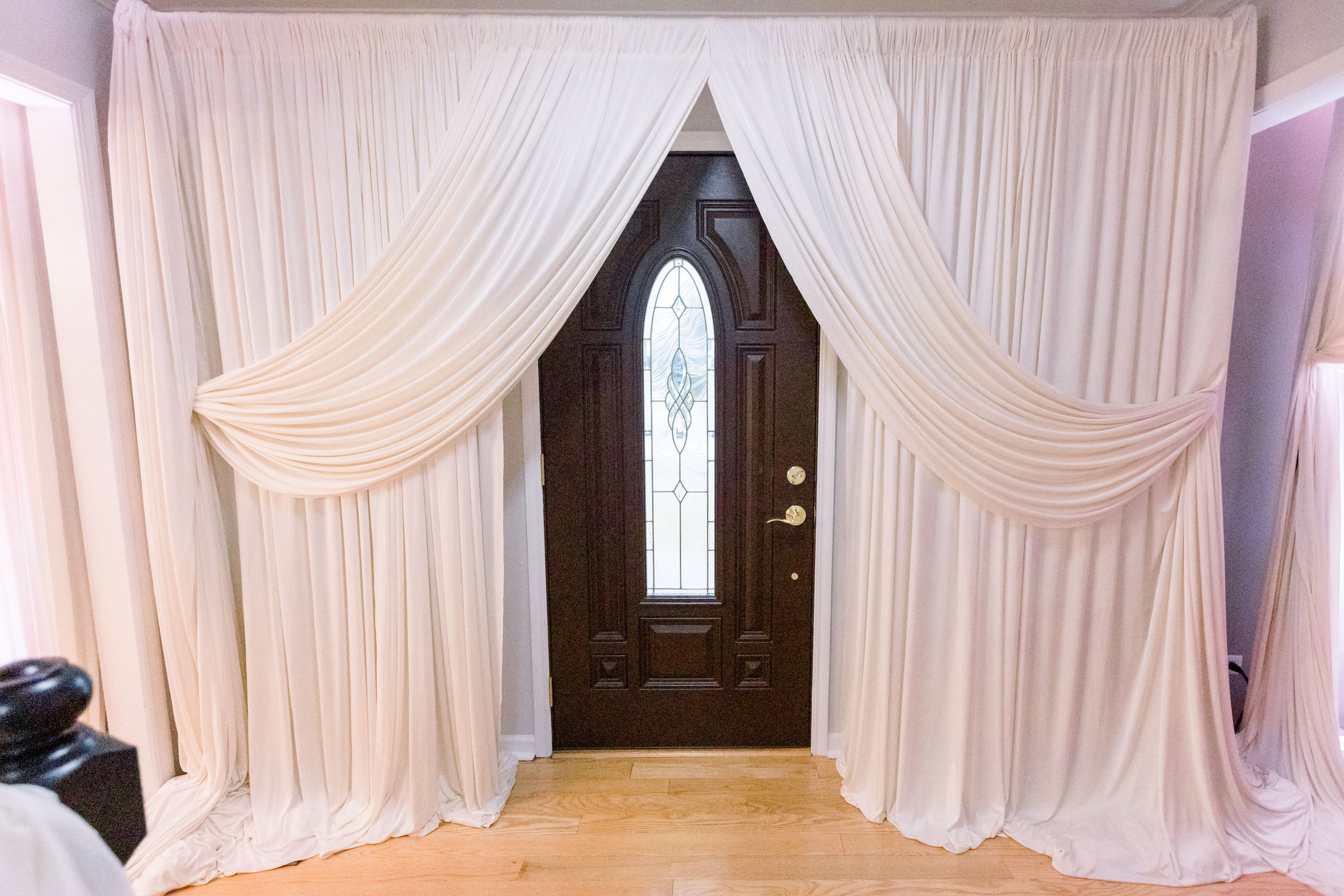 Basement wall draping wedding in the living room garage wall draping intimate wedding at home micro wedding event in chicago chiavari chairs table ren (12).jpg