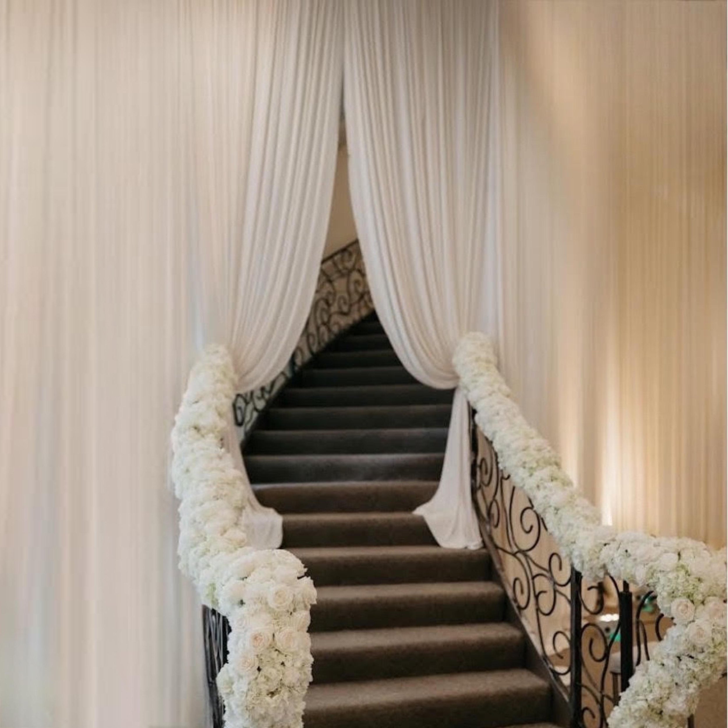 belvedere wedding decoration white dance floor cover chicago satin chair best luxury wedding decorator white floral wall printed initials on the dance floor naperville  (1).jpg