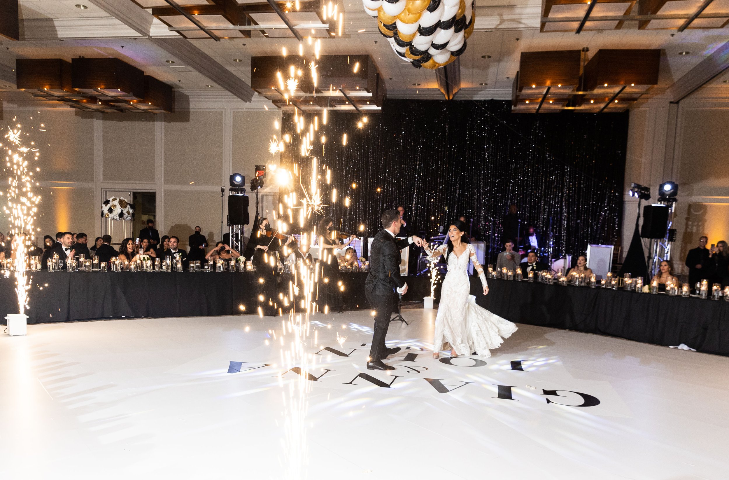 new years wedding balloon drop white dance floor cover westin itasca belvedere venutis wedding dparkler machine dance floor decal mirror table top rental wisteria  (56).jpg