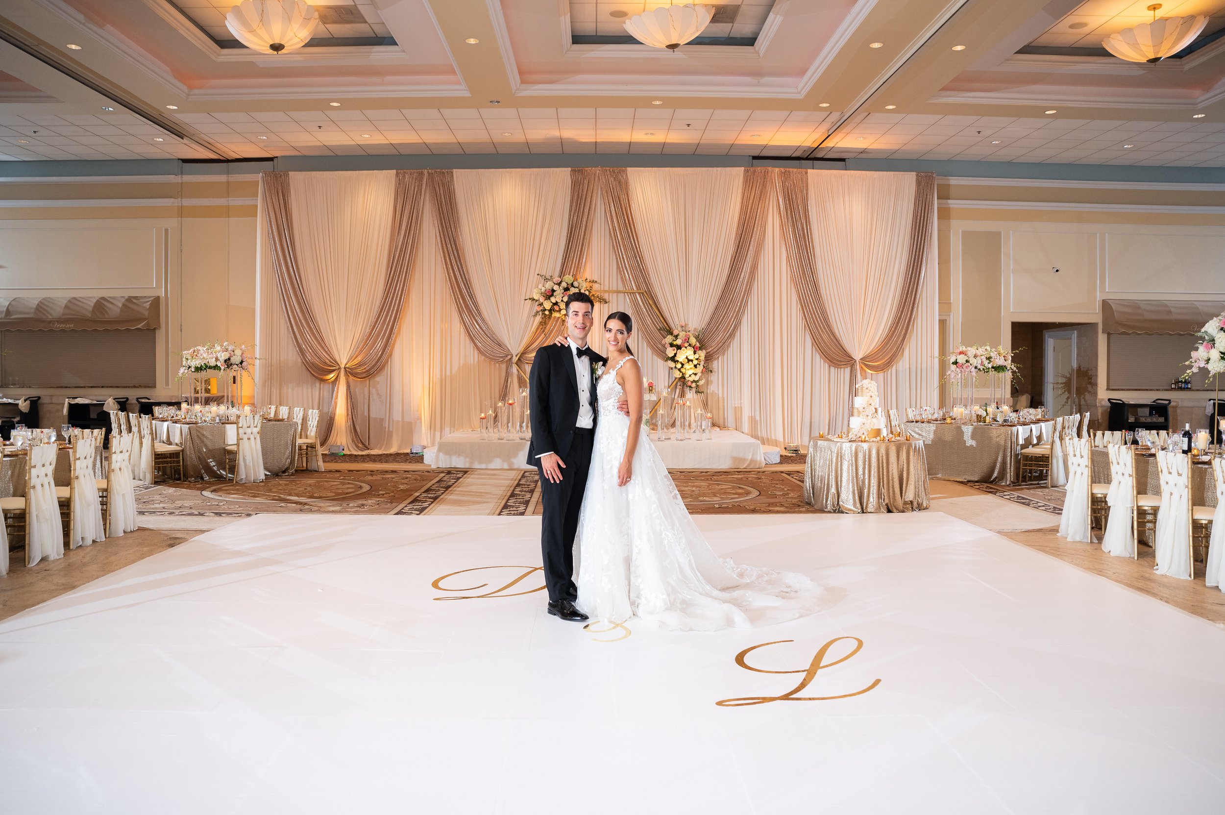 Venutis wedding decoration white dance floor at  venutis backdrop chuppah for jewish wedding in chicago (33).jpg