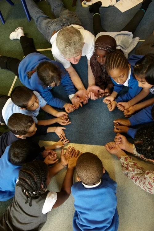Adam Annand (London Bubble) with Natasha Tomlin (teacher) and children from Grange Primary School doing a Speech Bubbles excercise