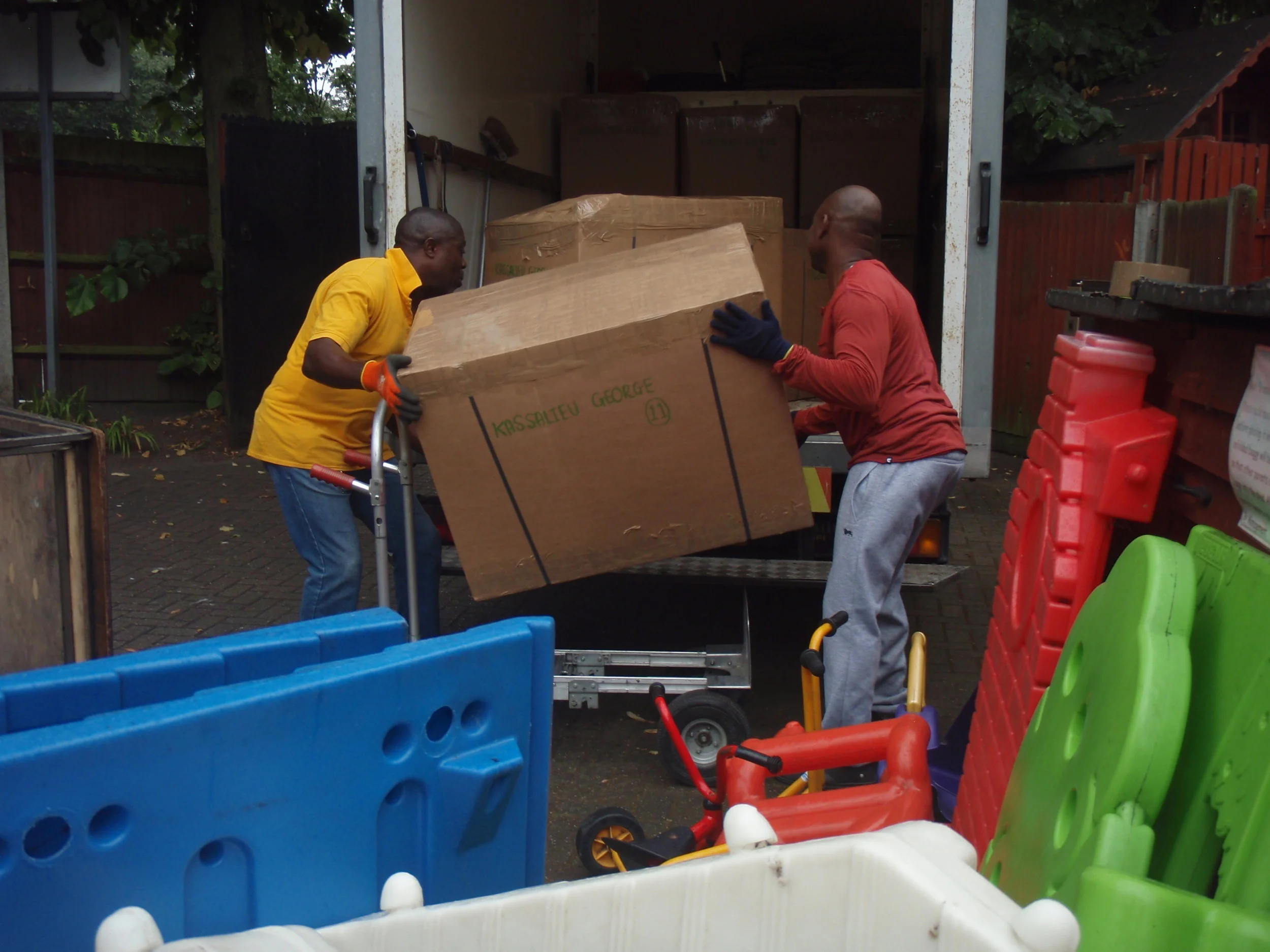  Loading the goods unto a removal van in London. 