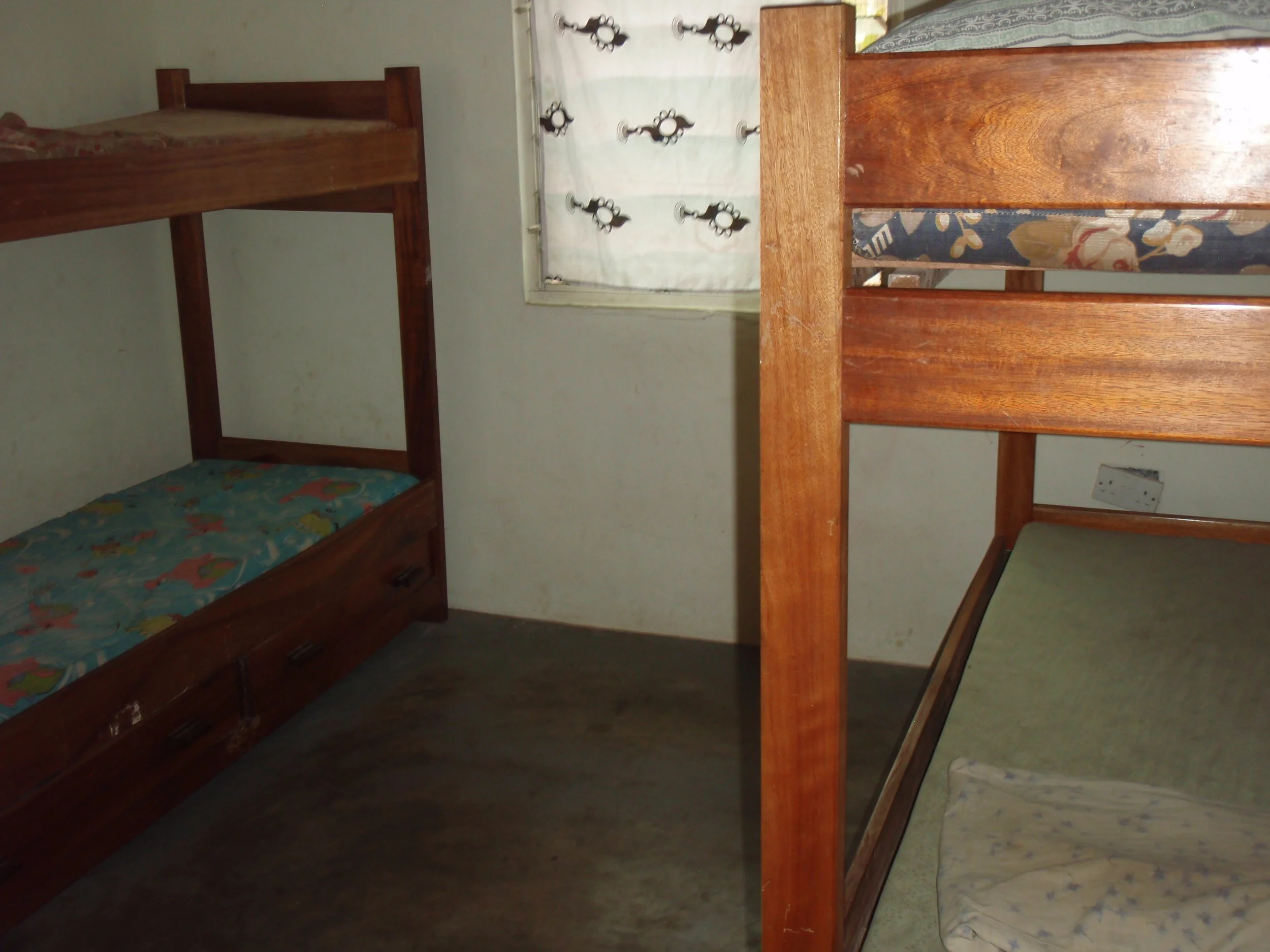  Eight children share these bunk beds in the orphanage. 