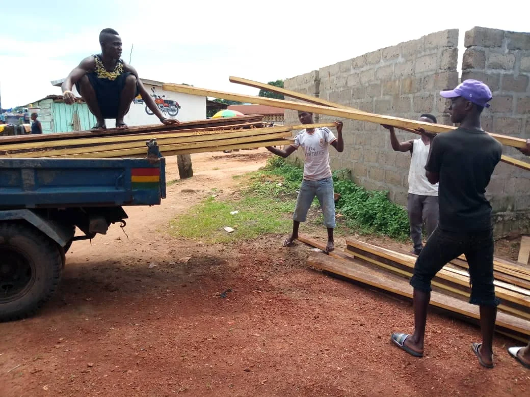  Builders are in the process of making bunkbeds for all the children. 