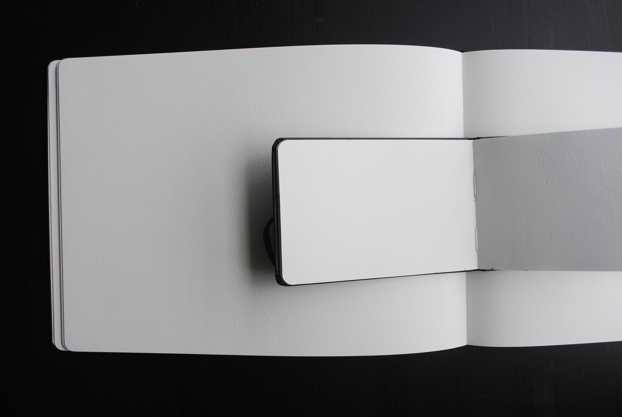 Once discovering Moleskin Sketchbooks, there's no going back. One of my favorite "always on me" items. They offer many convenient sizes perfect for travel. 