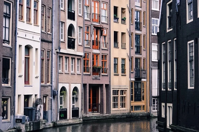 Known for beautiful canal houses and architectural charm