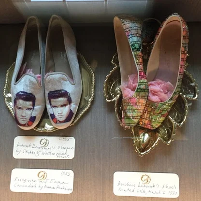 The Duchess’s Elvis slippers, next to a pair of her Givenchys.